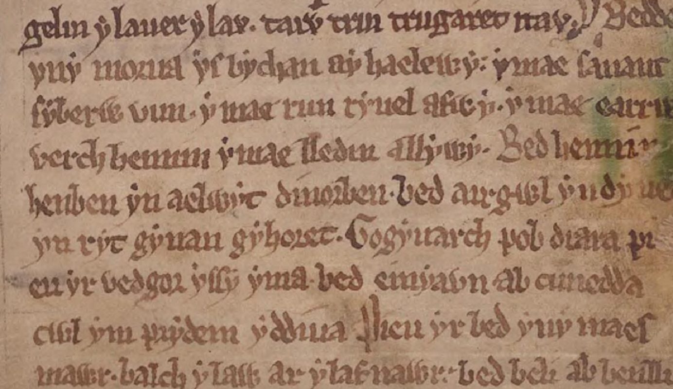 Black Book of Carmarthen, folio 35r, mentioning the grave of Hennin Henben on the fourth and fifth lines